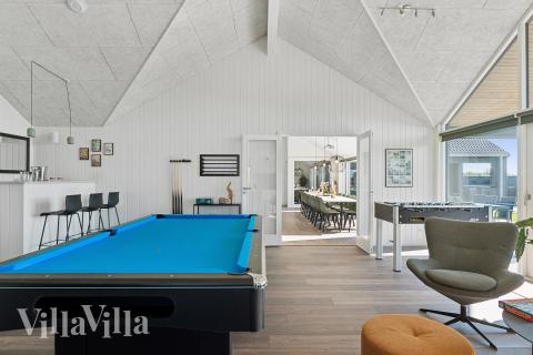 I tillegg til alle aktivitetsmulighetene i husets bassengavdeling, kan du også spille biljard, bordtennis og dart i luksushus nr. 673
