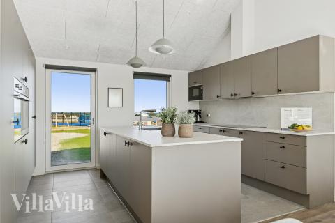 Kjøkkenet i luksushus nr. 673 er fullt utstyrt så dere lett kan lage mat til 20 personer.