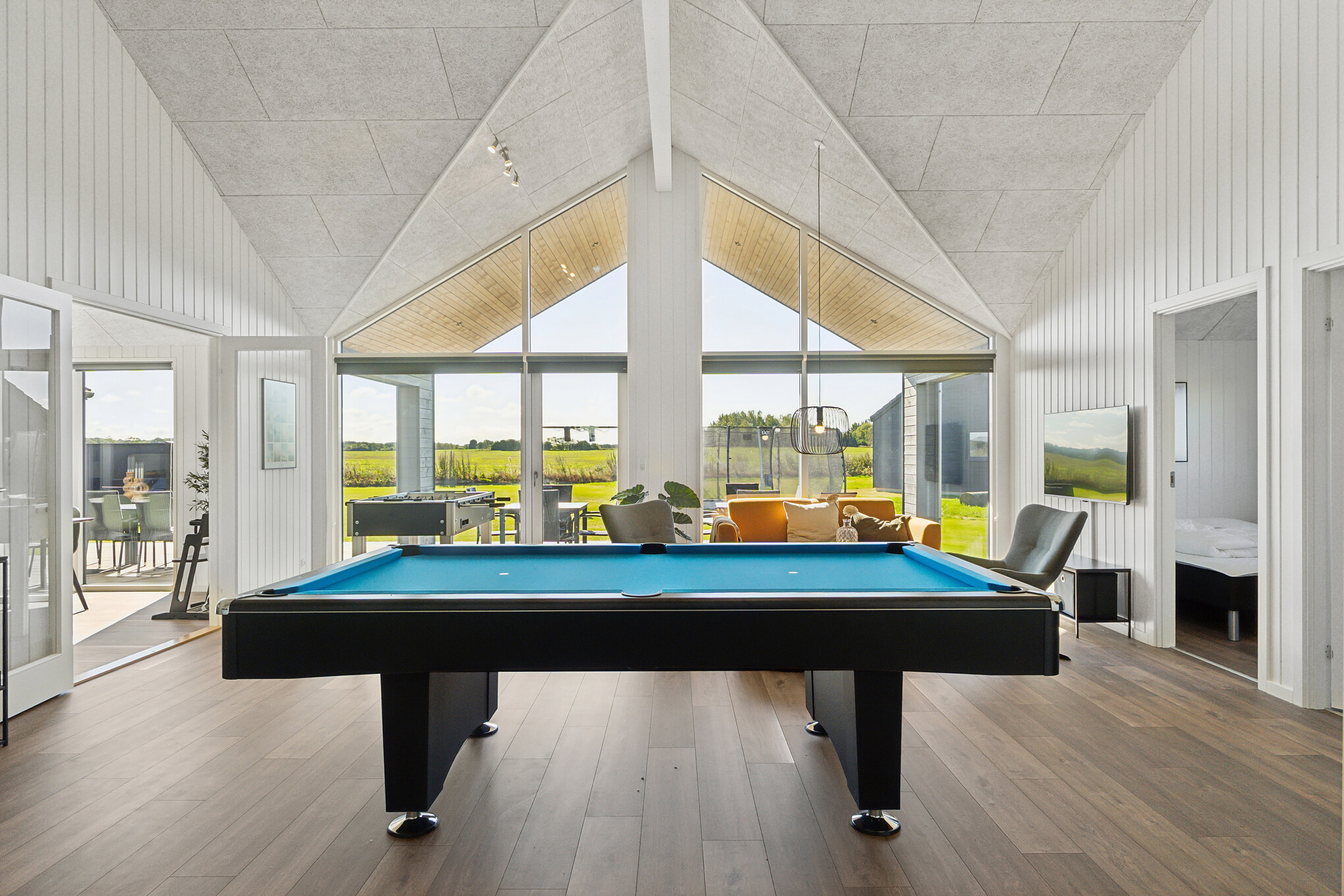 Konkurrer i feriehusets aktivitetsrom når dere besøker luksushus nr. 673 i Fyn og øyer.