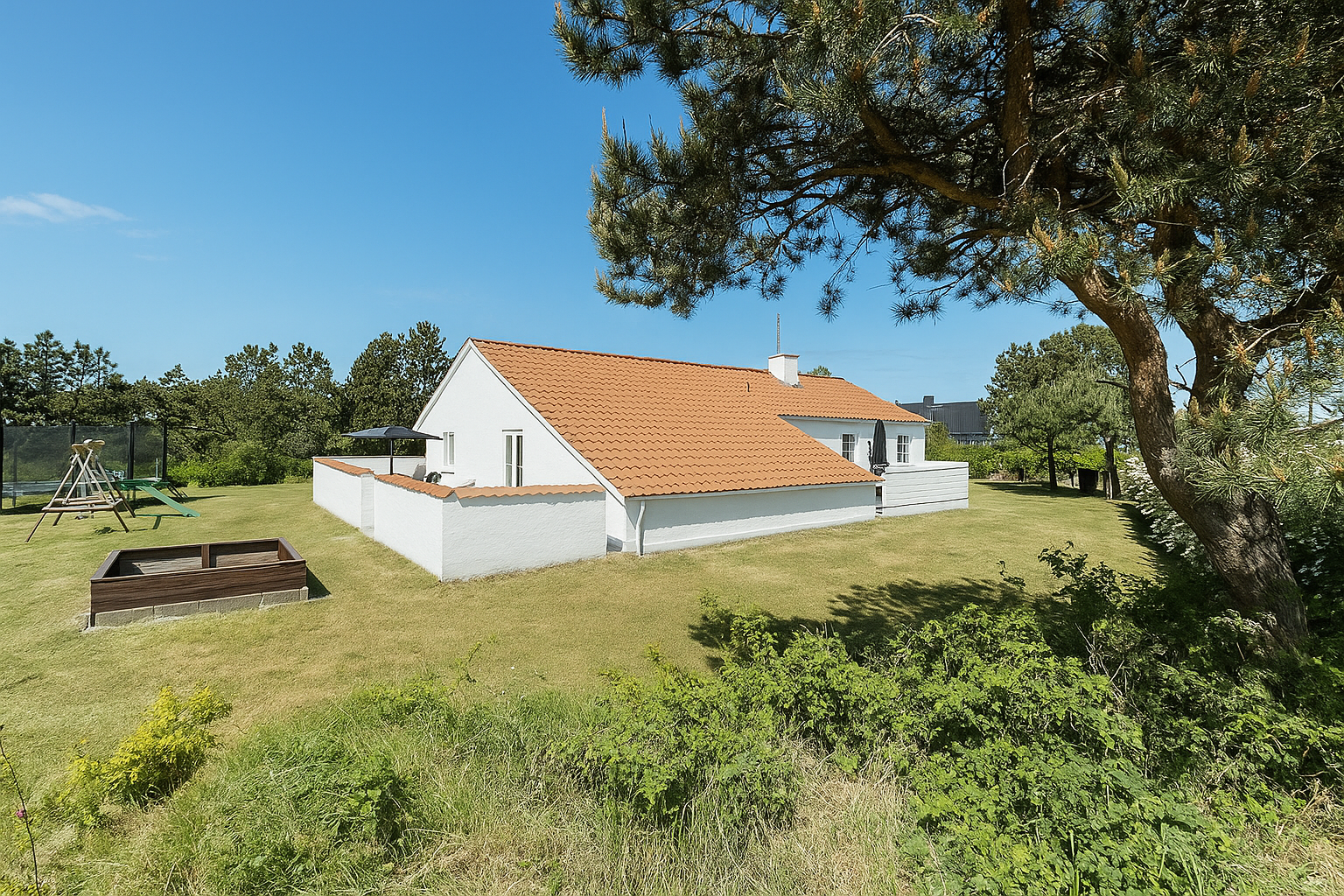Dette lekre huset med svømmebasseng, nr. 926, med plass til 14 personer, ligger i Østjylland