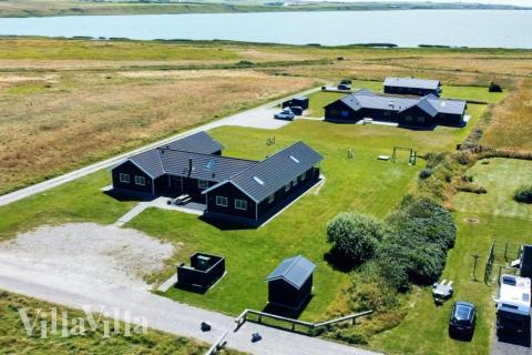 Dette lekre huset med svømmebasseng, nr. 293, med plass til 22 personer, ligger i Vestjylland