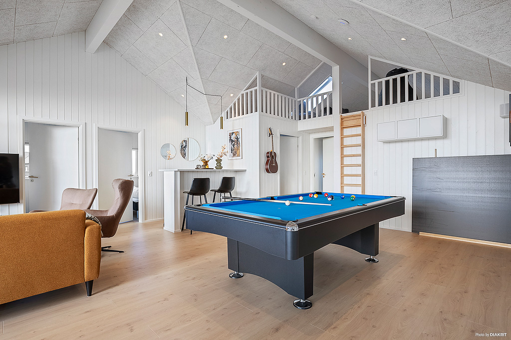 Konkurrer i feriehusets aktivitetsrom når dere besøker luksushus nr. 901 i Fyn og øyer.