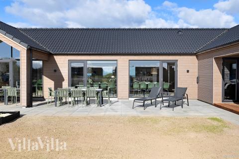 Nyt en grillkveld på terrassen i luksushus nr. 901 i Fyn og øyer