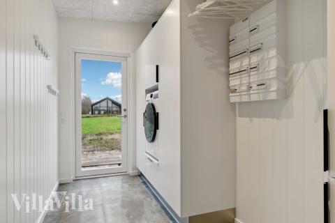 Det romslige inngangspartiet til luksushus nr. 936 i Limfjorden