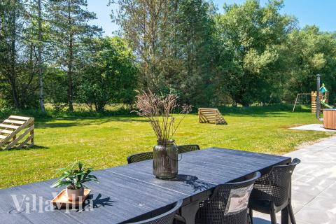 Luksushus nr. 938 har en deilig terrasse med gode hagemøbler til 16 personer.