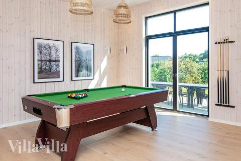Luksushus nr. 938 til 16 personer tilbyr et stort aktivitetsrom med bl.a. biljard og dart