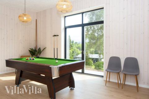 Luksushus nr. 939 til 16 personer tilbyr et stort aktivitetsrom med bl.a. biljard og dart