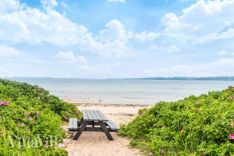 Stranden nær luksushus nr. 940.