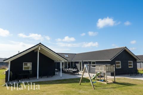Dette lekre huset med svømmebasseng, nr. 196, med plass til 22 personer, ligger i Nordjylland