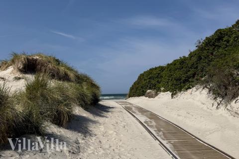 Stranden nær luksushus nr. 923.