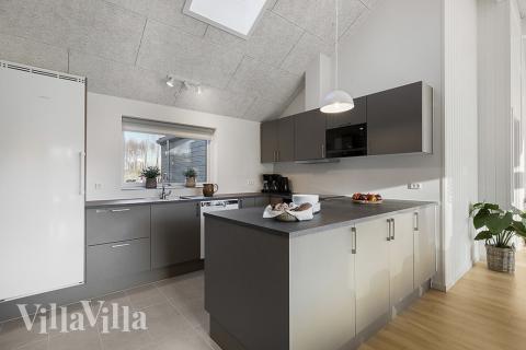 Kjøkkenet i luksushus nr. 802 er fullt utstyrt så dere lett kan lage mat til 16 personer.