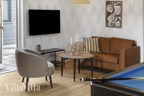 Luksushus nr. 802 til 16 personer tilbyr et stort aktivitetsrom med bl.a. biljard og dart