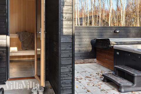 Nyt en grillkveld på terrassen i luksushus nr. 911 i Lolland/Falster/Møn