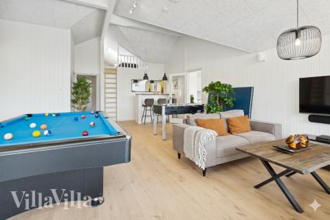 I tillegg til alle aktivitetsmulighetene i husets bassengavdeling, kan du også spille biljard, bordtennis og dart i luksushus nr. 598