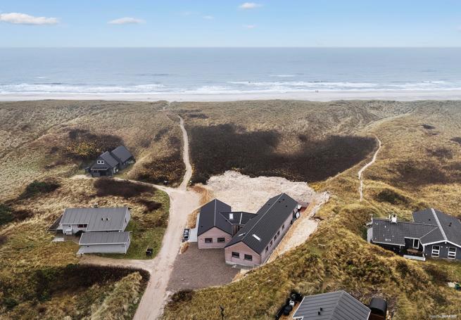 Dette lekre huset med svømmebasseng, nr. 900, med plass til 18 personer, ligger i Vestjylland