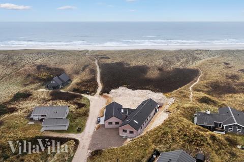 Dette lekre huset med svømmebasseng, nr. 900, med plass til 18 personer, ligger i Vestjylland