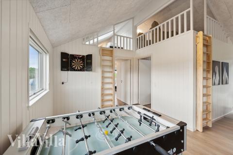 Konkurrer i feriehusets aktivitetsrom når dere besøker luksushus nr. 921 i Fyn og øyer.