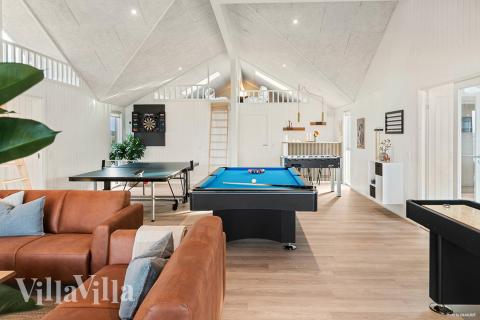 Konkurrer i feriehusets aktivitetsrom når dere besøker luksushus nr. 910 i Lolland/Falster/Møn.