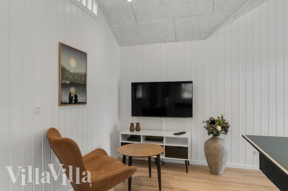 Luksushus nr. 922 til 14 personer tilbyr et stort aktivitetsrom med bl.a. biljard og dart