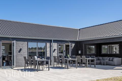 Nyt en grillkveld på terrassen i luksushus nr. 914 i Lolland/Falster/Møn
