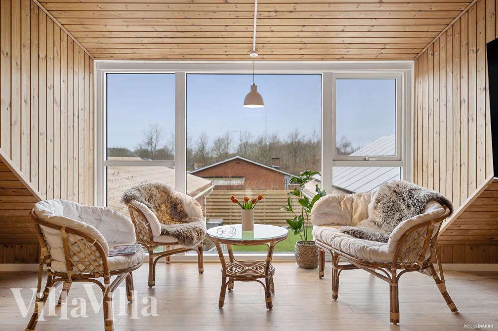 Oppholdsrom med plass til 26 i luksushus nr. 688.