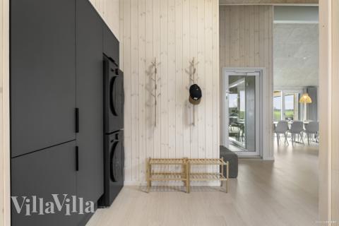 Det er god plass i inngangspartiet til luksushus nr. 906