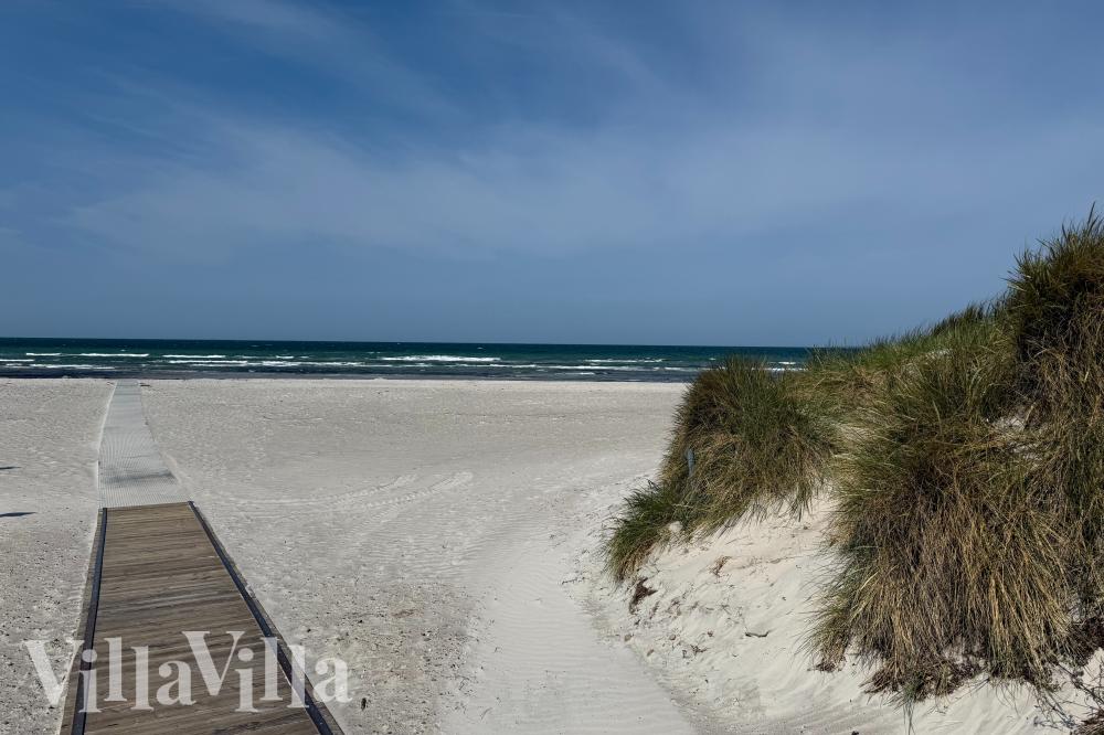Stranden nær luksushus nr. 910.