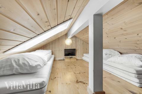 Noen av de 12 soveplassene i luksushus nr. 159 finnes på hems