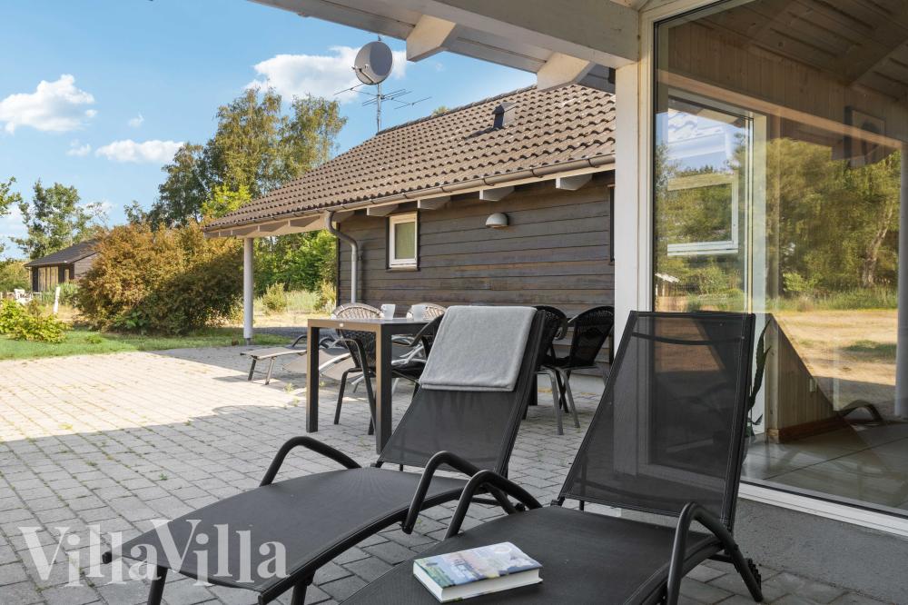 Nyt en grillkveld på terrassen i luksushus nr. 159 i Lolland/Falster/Møn