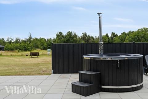 Nyt varmen i boblebadet i luksushus nr. 942 i Fyn og øyer