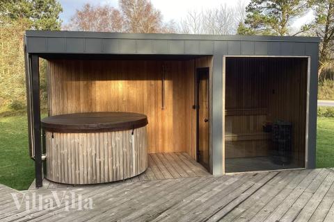 Nyt varmen i boblebadet i luksushus nr. 924 i Lolland/Falster/Møn