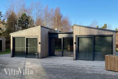 Nyt en grillkveld på terrassen i luksushus nr. 924 i Lolland/Falster/Møn