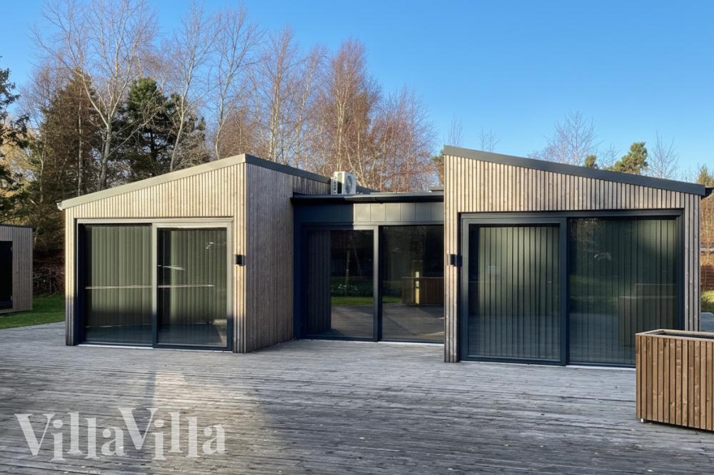 Nyt en grillkveld på terrassen i luksushus nr. 924 i Lolland/Falster/Møn
