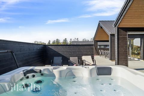 Nyt varmen i boblebadet i luksushus nr. 915 i Fyn og øyer