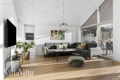 Det er god plass til hygge i feriehusets sofagruppe under oppholdet i luksushus nr. 810