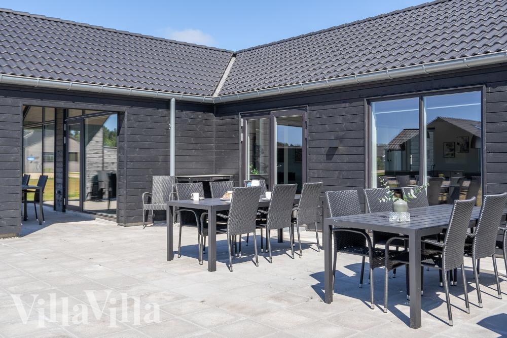 Nyt en grillkveld på terrassen i luksushus nr. 778 i Tyskland