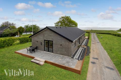 Dette lekre huset med spa, nr. 950, med plass til 9 personer, ligger i Fyn og øyer