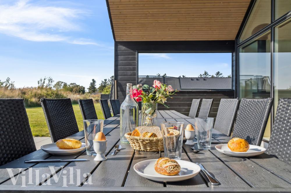 Nyt en grillkveld på terrassen i luksushus nr. 775 i Tyskland