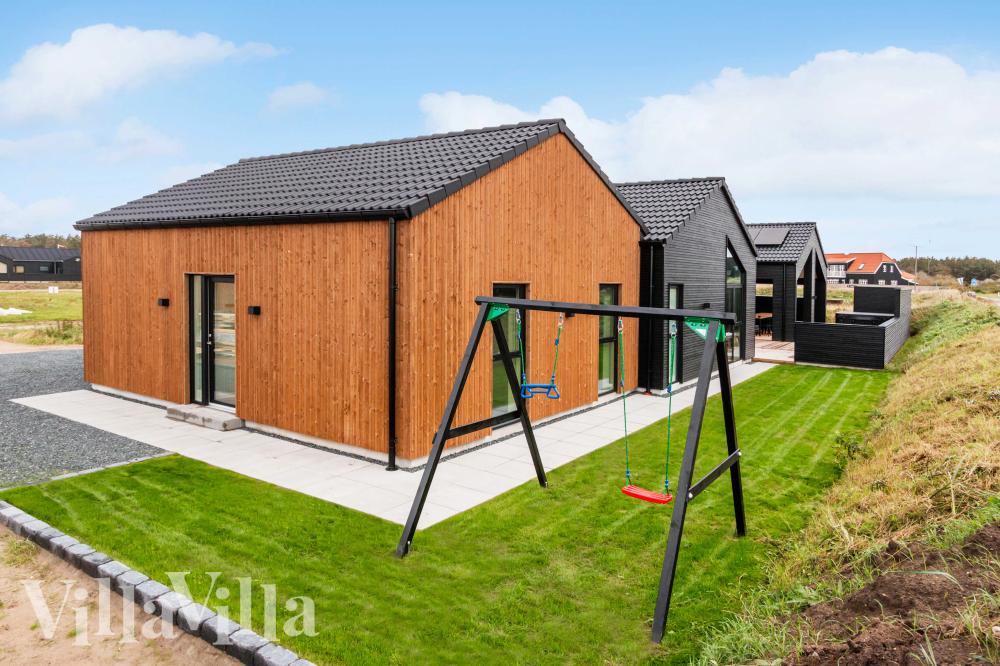 Dette lekre huset med svømmebasseng, nr. 682, med plass til 18 personer, ligger i Nordjylland