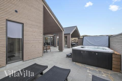 Nyt varmen i boblebadet i luksushus nr. 928 i Vestjylland