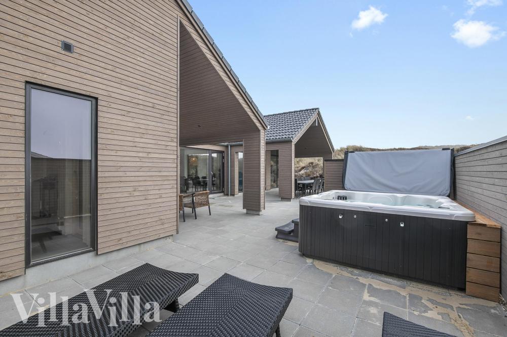 Nyt varmen i boblebadet i luksushus nr. 928 i Vestjylland