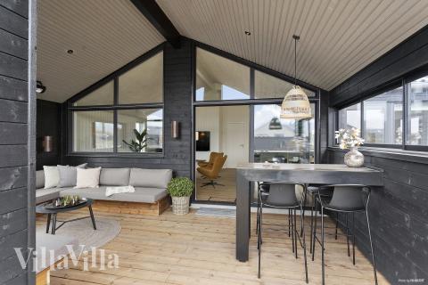Nyt en grillkveld på terrassen i luksushus nr. 919 i Fyn og øyer