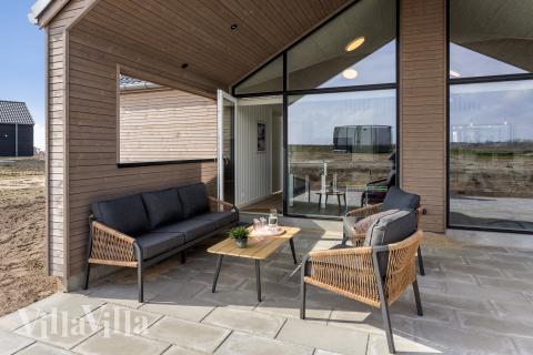 Nyt en grillkveld på terrassen i luksushus nr. 917 i Fyn og øyer