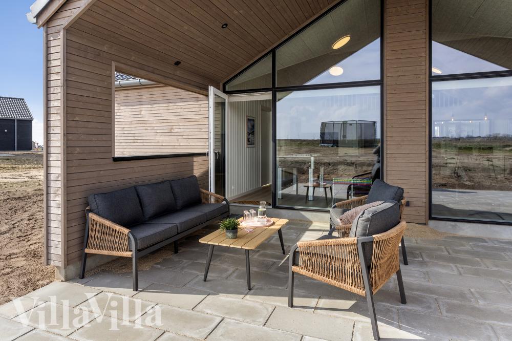 Nyt en grillkveld på terrassen i luksushus nr. 917 i Fyn og øyer