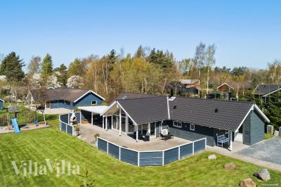 Dette lekre huset med spa, nr. 956, med plass til 12 personer, ligger i Lolland/Falster/Møn