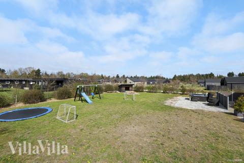 Dette lekre huset med svømmebasseng, nr. 484, med plass til 18 personer, ligger i Vestjylland