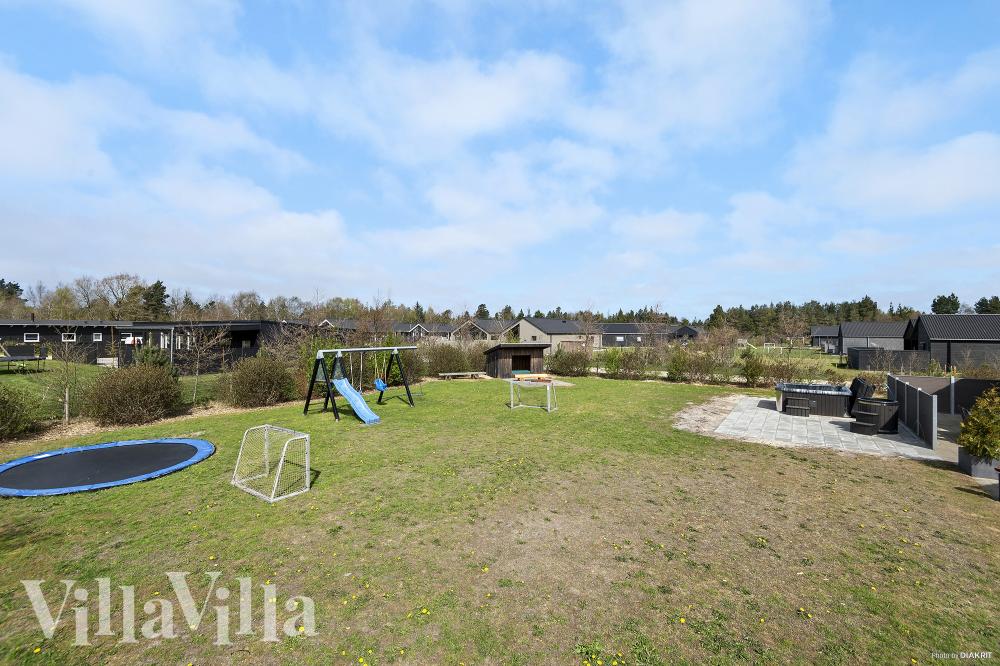 Dette lekre huset med svømmebasseng, nr. 484, med plass til 18 personer, ligger i Vestjylland