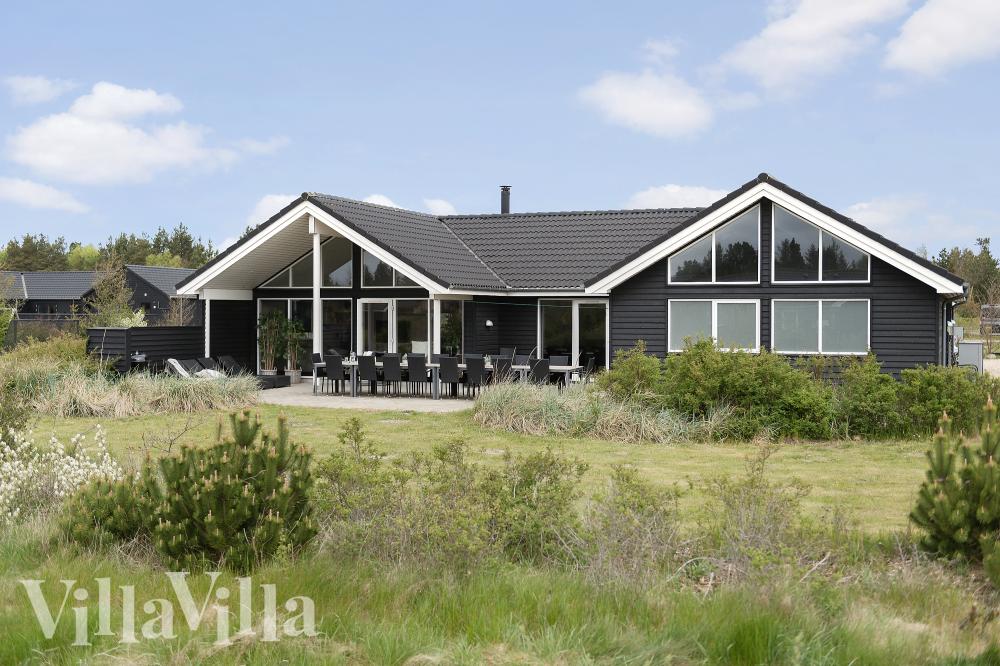 Dette lekre huset med svømmebasseng, nr. 456, med plass til 20 personer, ligger i Vestjylland