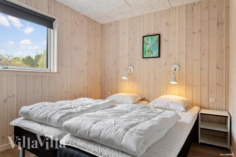 Et av de 7 soverommene i luksushus nr. 622 i Bornholm.