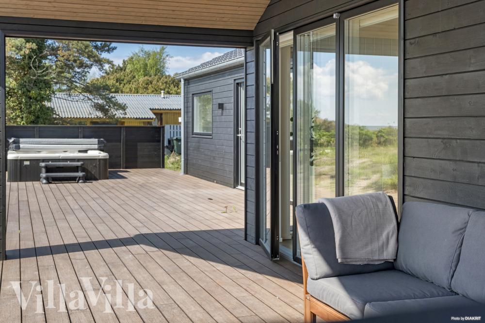 Nyt en grillkveld på terrassen i luksushus nr. 935 i Nordsjælland